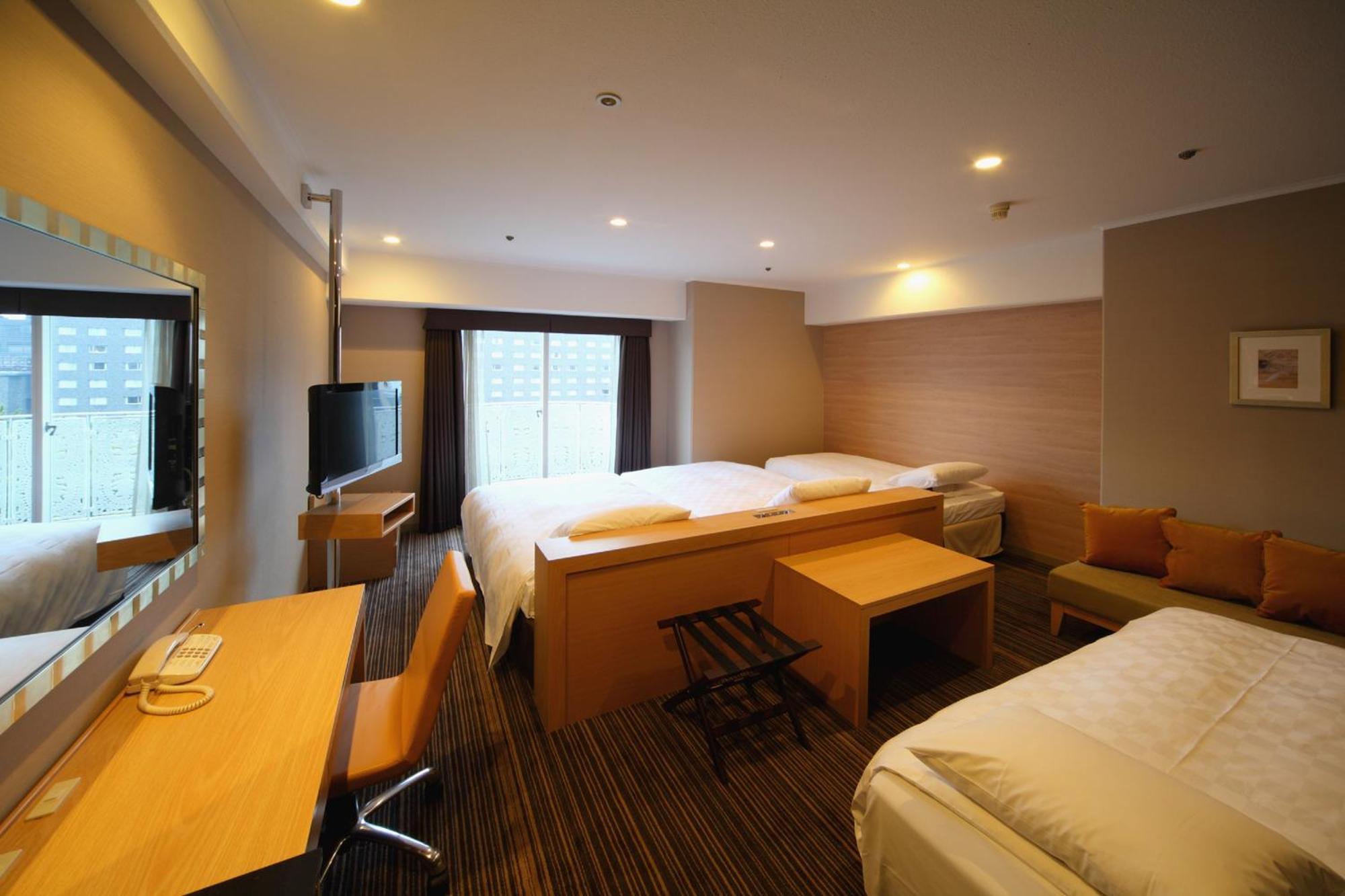 Grand Prince Hotel Shin Takanawa Präfektur Tokio Zimmer foto A room at the hotel